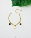 black & gold vancleef bracelet